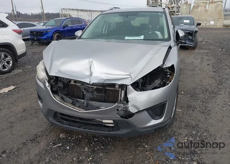 2014 Mazda Cx-5 Sport z USA, uszkodzony, nr VIN JM3KE2BEXE0311819